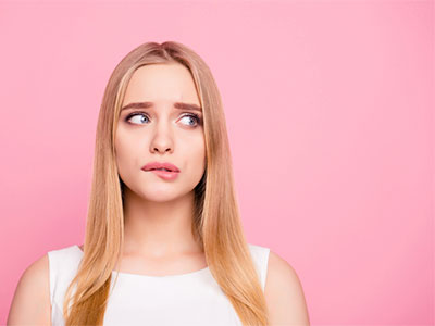 woman looking worried